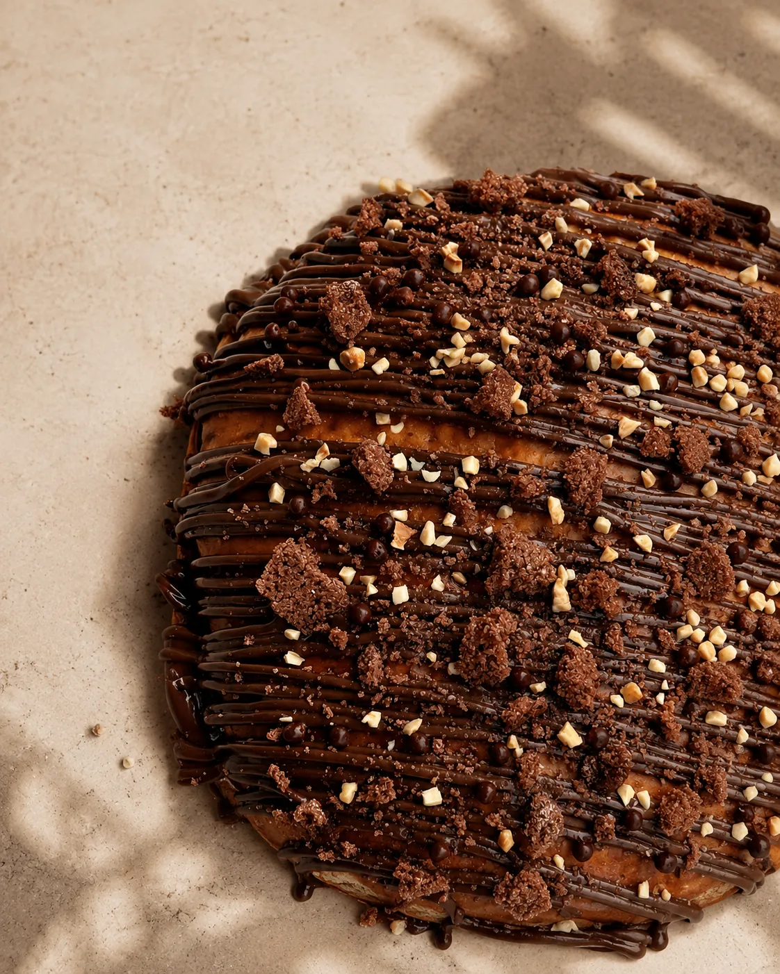 Coca de La Pasti amb xocolata i avellanes